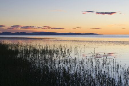 Sunset on the lake. Mongolia.の写真素材