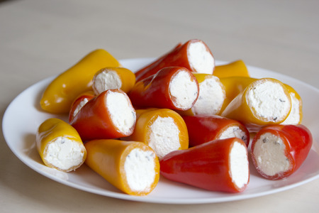 Mini peppers stuffed with cheese.の写真素材