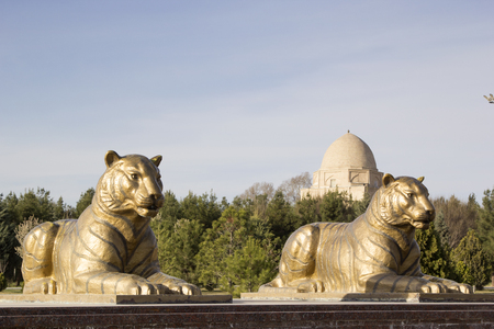 Statues of two tigers in Samarkand near the mausoleum of Rukhabad.のeditorial素材
