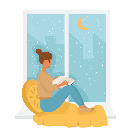 In winter, a girl sits on the windowsill and reads a book. In socks, a sweater and a blanket. Snow is falling. Vector illustration in a flat style. A cozy landscapeのイラスト素材