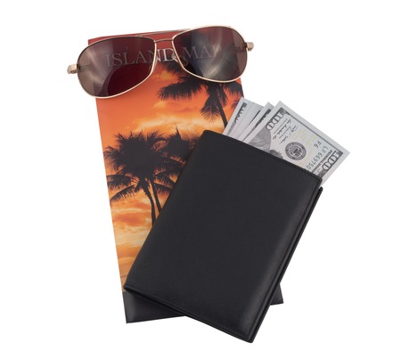 passport and money on a white backgroundの写真素材