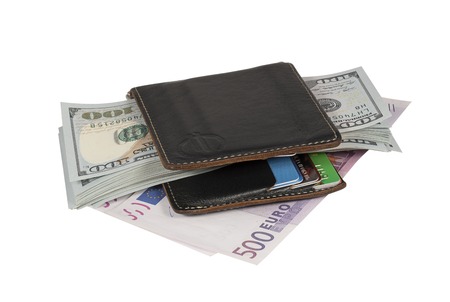 Pack of dollars on a white backgroundの写真素材