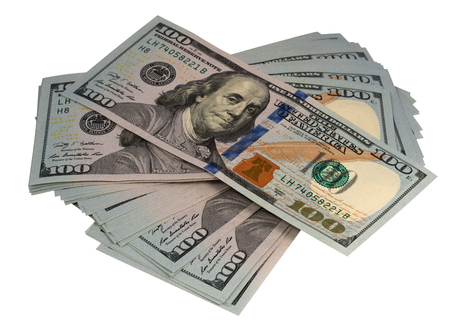 Pack of dollars on a white backgroundの写真素材