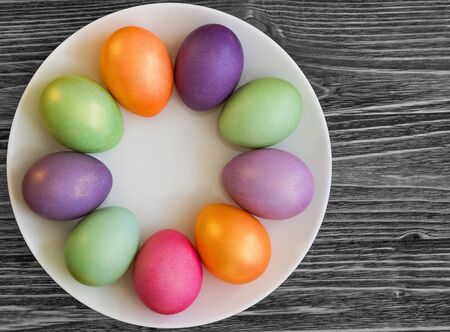 Easter eggs on a wooden backgroundの写真素材
