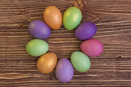 Easter eggs on a wooden backgroundの写真素材