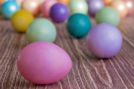 Easter eggs on a wooden backgroundの写真素材