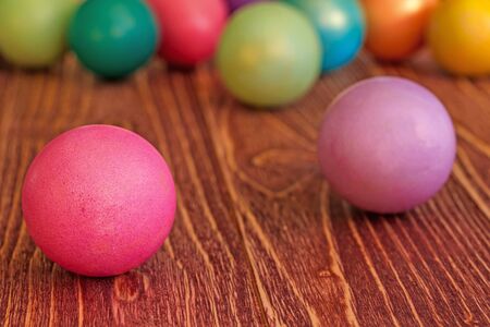 Easter eggs on a wooden backgroundの写真素材
