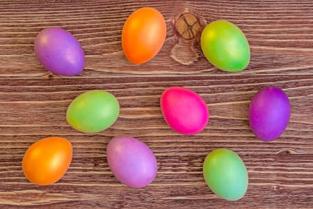 Easter eggs on a wooden backgroundの写真素材