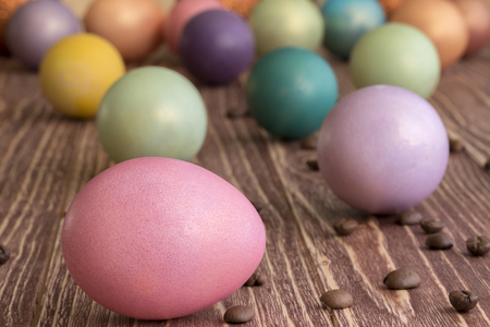 Easter eggs on a wooden backgroundの写真素材