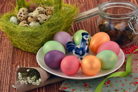 Easter eggs on a wooden backgroundの写真素材