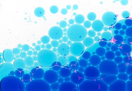 Circles from a multi-coloured liquid