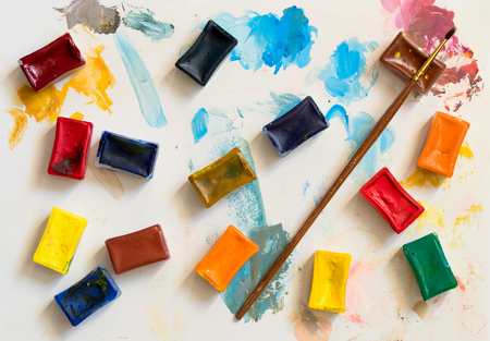 Colours and a paintbrush for drawingの写真素材