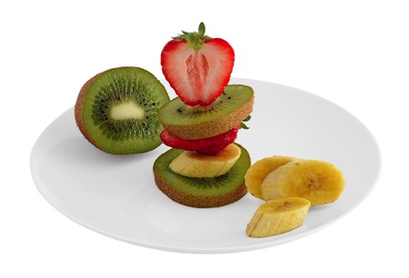 slices of strawberry, banana, kiwi fruit on the tableの写真素材