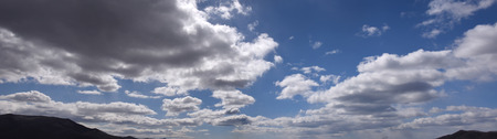 White and gray clouds in the blue skyの写真素材