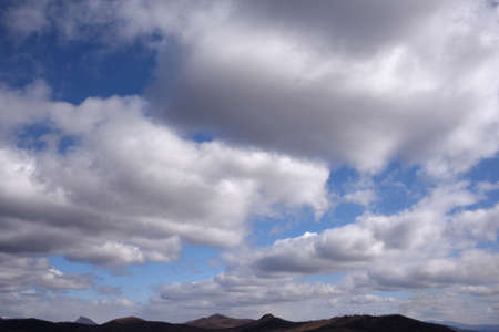 White and gray clouds in the blue skyの写真素材