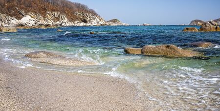 Waves of the Pacific Ocean on the rocksの写真素材