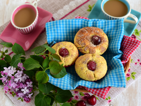 Homemade muffins on a white wooden backgroundの写真素材