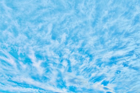 Clouds in blue sky. Sky with fluffy clouds backgroundの写真素材