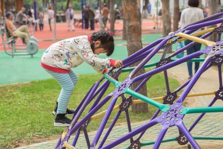Harbin, Heilongjiang, China - September 2018: Little girl in the sports parkのeditorial素材