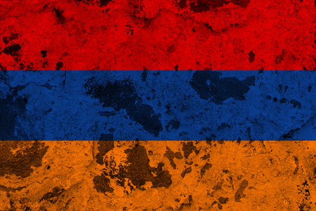 Armenia flag on old wall. Patriotic grunge background. National flag of Armeniaの写真素材