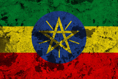 Ethiopia flag on old wall. Patriotic grunge background. National flag of Ethiopiaの写真素材
