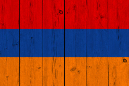 Armenia flag painted on old wood plank. Patriotic background. National flag of Armeniaの写真素材