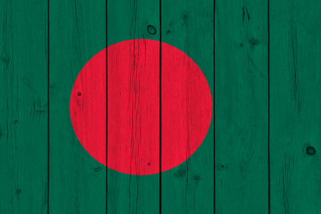 Bangladesh flag painted on old wood plank. Patriotic background. National flag of Bangladeshの写真素材