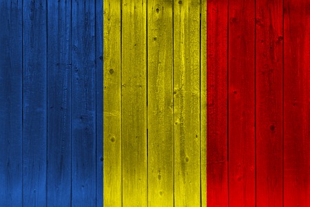 Chad flag painted on old wood plank. Patriotic background. National flag of Chadの写真素材
