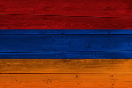 Armenia flag painted on old wood plank. Patriotic background. National flag of Armeniaの写真素材