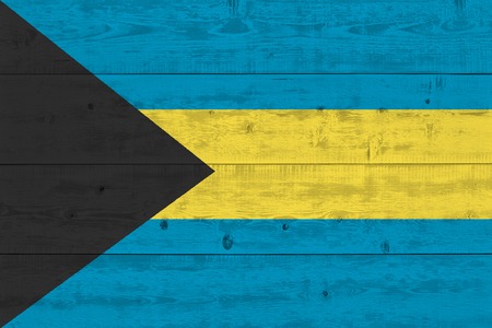 Bahamas flag painted on old wood plank. Patriotic background. National flag of Bahamasの写真素材