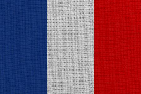 France fabric flag. Patriotic background. National flag of Franceの写真素材