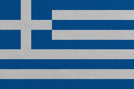 Greece fabric flag. Patriotic background. National flag of Greeceの写真素材