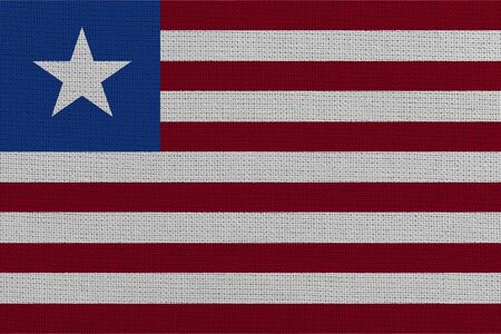 Liberia fabric flag. Patriotic background. National flag of Liberiaの写真素材
