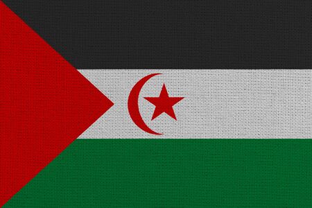 Sahrawi Arab Democratic Republic fabric flag. Patriotic background. National flag of Sahrawi Arab Democratic Republicの写真素材