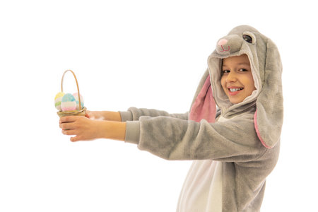 Girl in bunny costume keep the basket Easter eggs. isolated on white. easter holiday concept