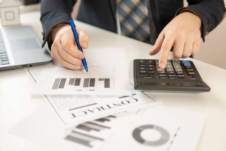 businessman at the table to sign a contract. close-up