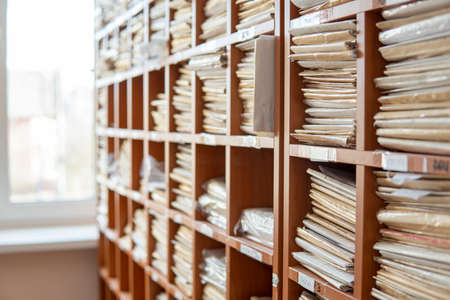 Generic Medical Record Folder on Shelf. close-upの写真素材