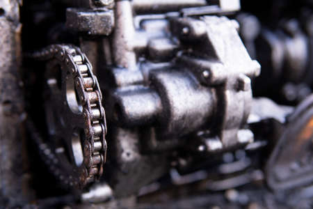 4 cylinder one motor head with disassembled exhaust manifold of old industrial heavy truck V 8...