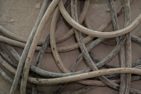 old rusty bundles and knots of thick metal wires.の写真素材
