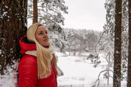 Portrait of a Girl in the Winter Forest. high qualityの写真素材