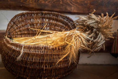 stakes of bread lie in a wicker basket.の写真素材