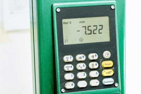 Industrial digital automatic height gauge equipment tool monitor with keyboard displaying measures...