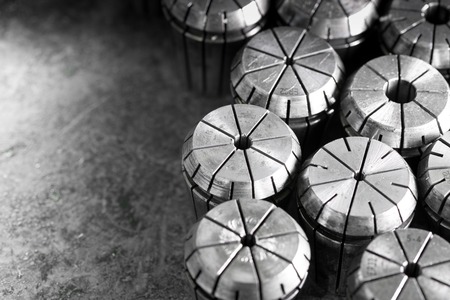 CNC ER32 tool holder collets of different size in a box in black and white colorsの写真素材