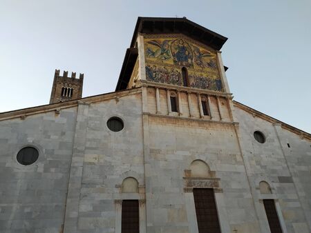 Lucca, Tuscany, Italy, January 12, 2020. Basilica of San Frediano, church of 1100 with facade and mosaic, view in the evening, building facade details.のeditorial素材