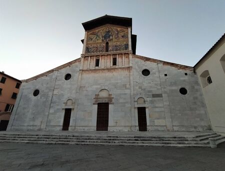 Lucca, Tuscany, Italy, January 12, 2020. Basilica of San Frediano, church of 1100 with facade and mosaic, view in the evening, building facade details.のeditorial素材