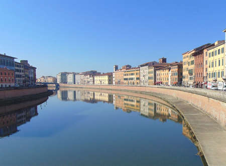 Pisa Tuscany Italy. January 7th, 2019. View of the city from bridge "Ponte di Mezzo" on river Arno at sunset, panorama.のeditorial素材