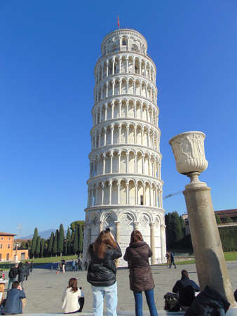 Pisa Tuscany Italy. January 7th, 2019. Leaning Tower of Pisa and a lot of tourists taking photos.のeditorial素材