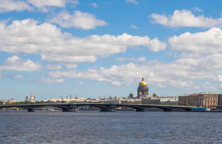 St. Petersburg, Russia. June 21, 2020. View of the Blessed Bridge and historic buildings across the Neva River in the central part of the city. Horizontal orientation, selective focus.のeditorial素材