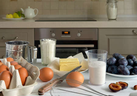 Products prepared for baking seasonal plums. Baking ingredients. Horizontal orientation, selective...