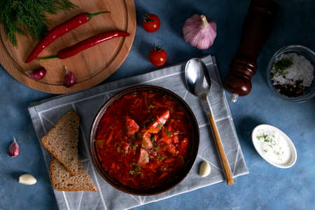 Top view of the traditional popular Russian soup borscht made from cabbage, beets and other...